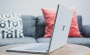 macbook pro on white couch