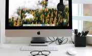 Free Turned on Silver Imac With Might Mouse and Keyboard Stock Photo