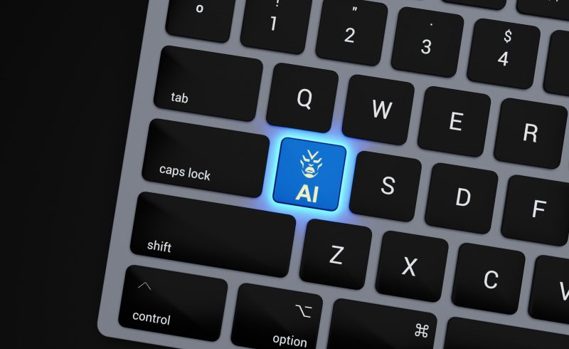 a-close-up-of-a-keyboard-with-a-blue-button