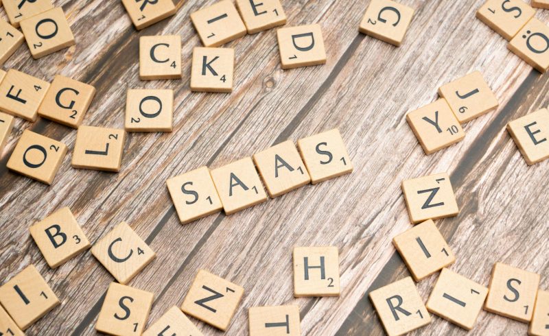 scrabble-letters-spelling-saas-on-a-wooden-tabl
